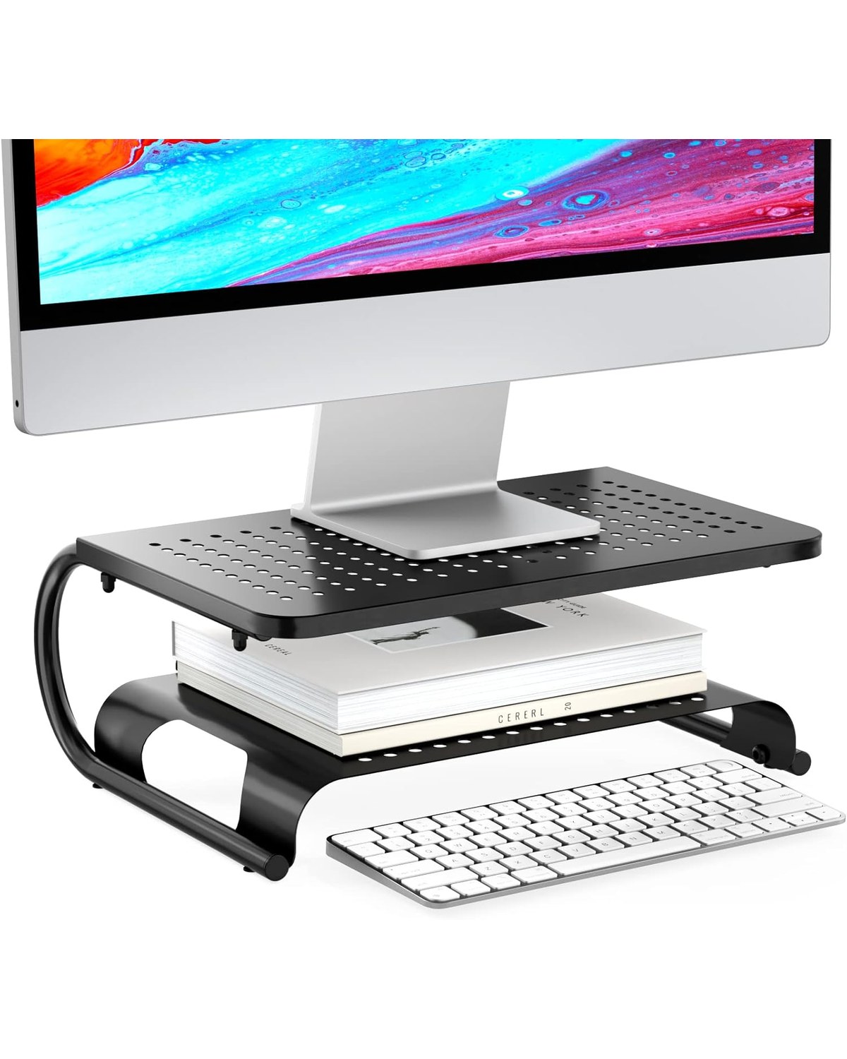 A black vented metal 2-tier monitor stand on a tidy desk, with a 27-inch monitor elevated to eye level and the lower shelf holding a keyboard and cable box.
