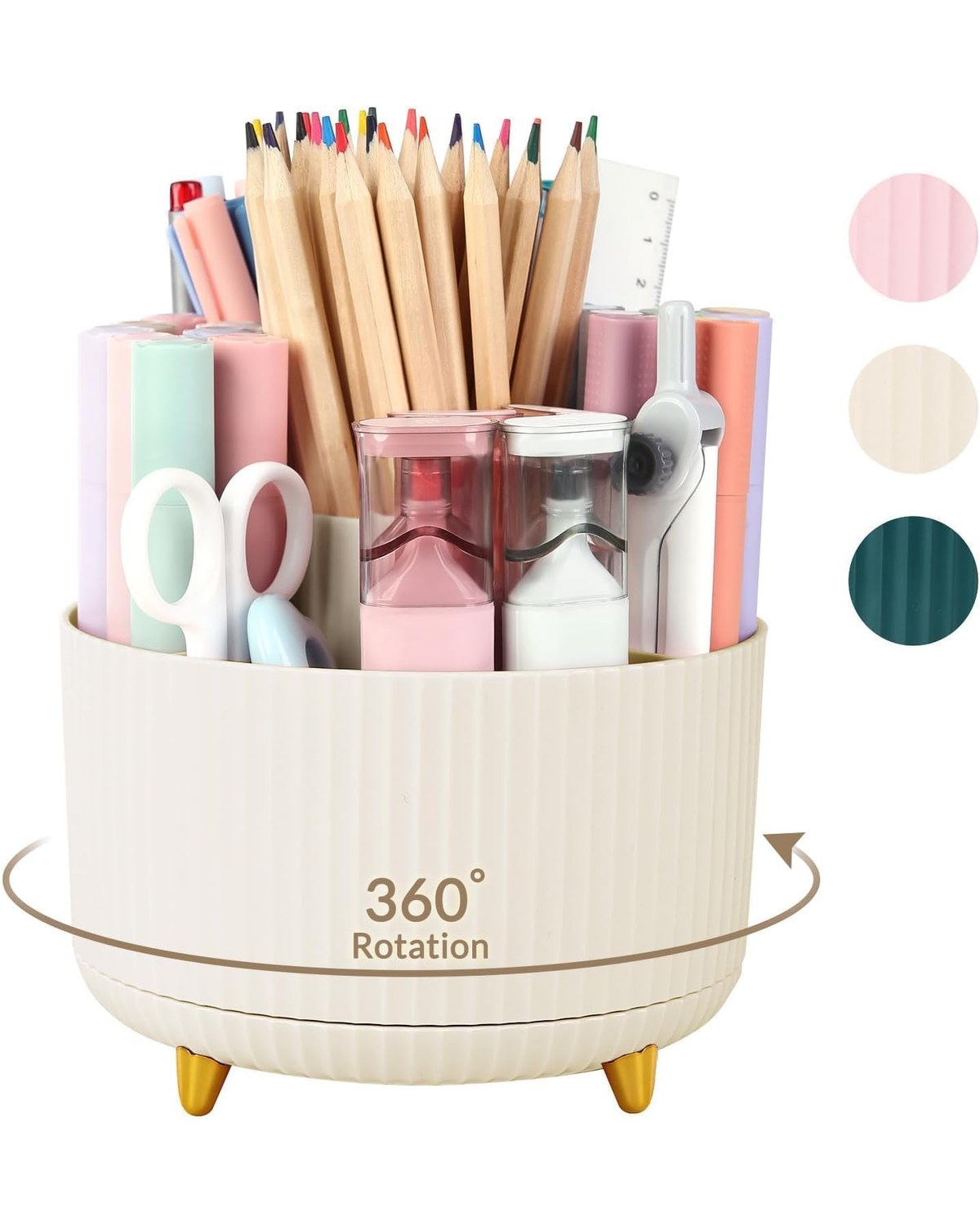 A white 360-degree rotating pen organizer on a clean desk, five compartments holding pens, scissors, a ruler, and highlighters, partially rotated to show the back section.